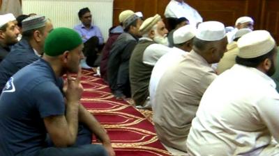 Muslims in prayer