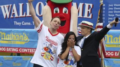 Joey Chestnut and his fiancée