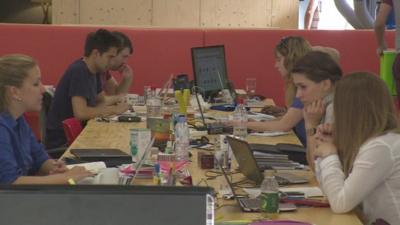 Young people working at computers