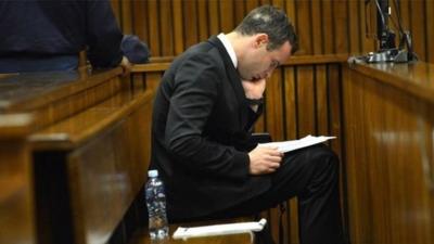 Oscar Pistorius sits in the dock at the Pretoria High Court on July 7, 2014