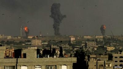 Smoke and flames are seen following what witnesses said were Israeli air strikes in Rafah in the southern Gaza Strip