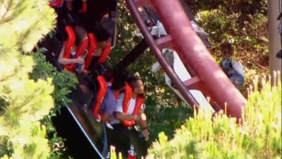 People stuck on a rollercoaster