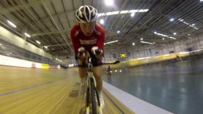 A Welsh cyclist training in a velodrome