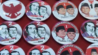 Pins featuring presidential candidates Joko Widodo and Prabowo Subianto in Jakarta, Indonesia, 2 July 2014