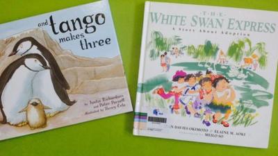 Pictures of And Tango Makes Three and The White Swan Express, two books banned by the Singapore National Library Board in July 2014.