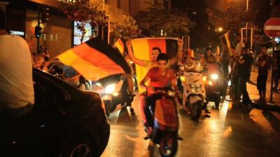 Fans waving German flags