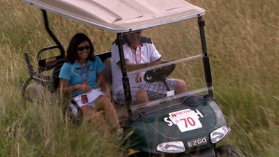 A gold buggy in the rough at the Women's British Open at Royal Birkdale