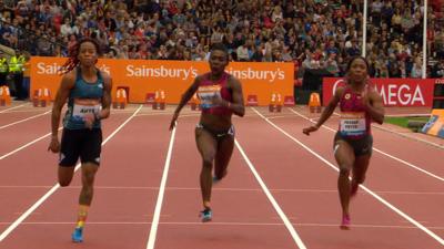 Trinidad and Tobago's Michelle-Lee Ahye (L) beats Shelly-Ann Fraser-Pryce (R) in the 100m in Glasgow