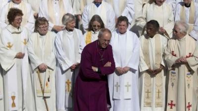 Archbishop of Canterbury Justin Welby with female priests