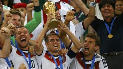 Winners Germany lift the World Cup trophy at the Maracana in Rio de Janeiro after a 1-0 extra time win over Argentina