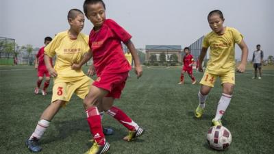 Young players at the Evergrande International Football School