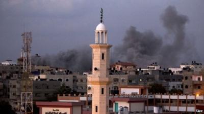 Smoke rising following an Israeli air strike on Gaza City, July 15, 2014