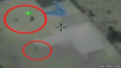 A still image from footage released by the Israel Defense Forces purports to show the moment an air strike was abandoned over Gaza to spare civilian lives