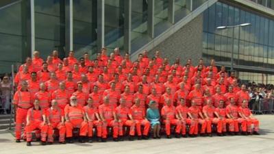 The Queen with railway workers