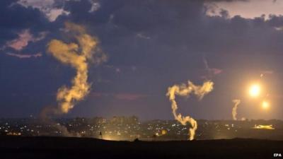 Israeli flares light up the sky ahead of the Gaza ground offensive, 17 July