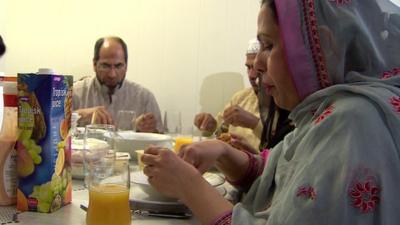 A family in Norway having a meal during Ramadan