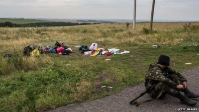 Separatist fighter at scene of MH17 crash