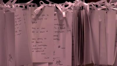 Notes at a makeshift memorial for MH17 victims in a Malaysian shopping mall