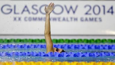 A swimmer practices at the Tollcross International Swimming Centre in Glasgow, Scotland, 22 July 2014