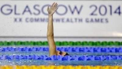 A swimmer practices at the Tollcross International Swimming Centre in Glasgow, Scotland, 22 July 2014