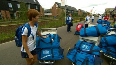 Athletes move into the Athletes' Village