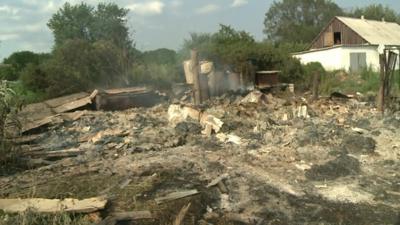 Destroyed wooden house