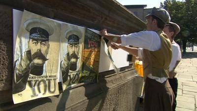 Actors play volunteers posting images of Lord Kitchener