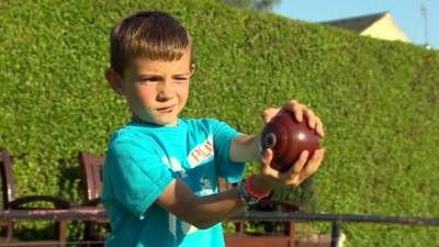 Josh, 6 throwing a bowl