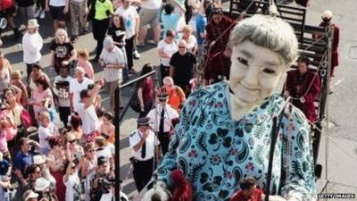 Giant puppet on the streets in Liverpool