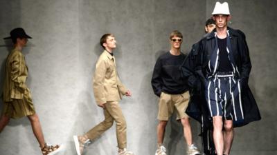 Models wear designs by E. Tautz during London Collections for Men Spring/Summer 2015
