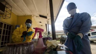 Medics wear protective gear at Sierra Leone hospital