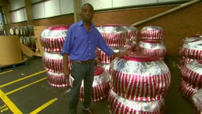 Clive Myrie with giant teacakes