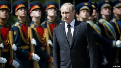 Russian President Vladimir Putin attends a ceremony to commemorate the anniversary of the beginning of the Great Patriotic War against Nazi Germany in 1941 in Moscow - 22 June 2014