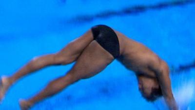 Ahmad Amsyar Azman goes head first into the Royal Commonwealth Pool