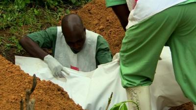 Ebola victim is laid to rest in Guinea