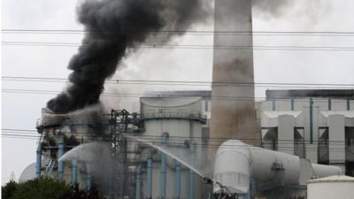 Smoke rises from a fire at Ferrybridge C Power Station at Ferrybridge in west Yorkshire July 31, 2014.