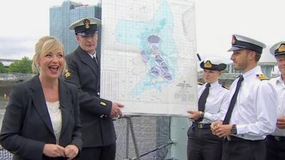 Carol Kirkwood and members of the Royal Navy