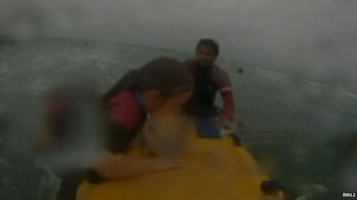 RNLI rescue girl in rip current