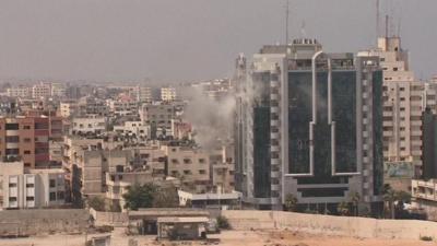 Gaza building is blasted by air strike