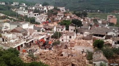 A general view shows collapsed houses after an earthquake hit Ludian county, Yunnan province