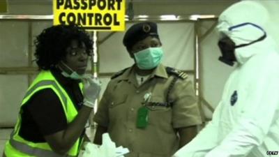 Screening staff at Nigeria's Murtala Muhammed International Airport in Lagos