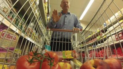 Steve Rosenberg and shopping trolley of produce