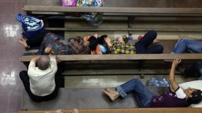 Displaced Christians sleeping in a church in Irbil