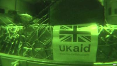 Infra red shot of pallet of goods labelled 'UK aid'