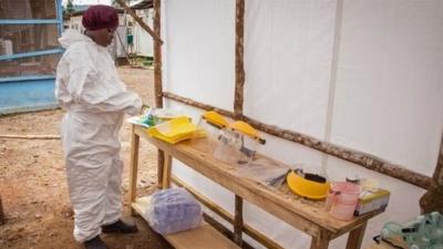 A woman wearing protective clothing