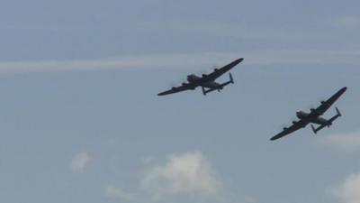 Two World War Two Lancasters fly in tandem for the first time in 50 years