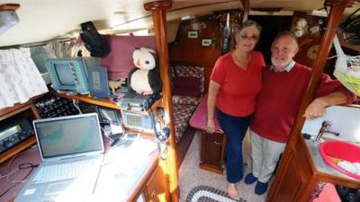 Clive and Jane Green on their yacht