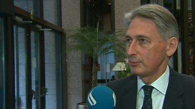 Foreign Secretary Philip Hammond speaking from Brussels