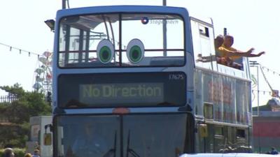 The singers on a bus