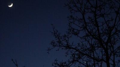 The Moon, with Jupiter and Venus in conjunction at the bottom right, in 2012